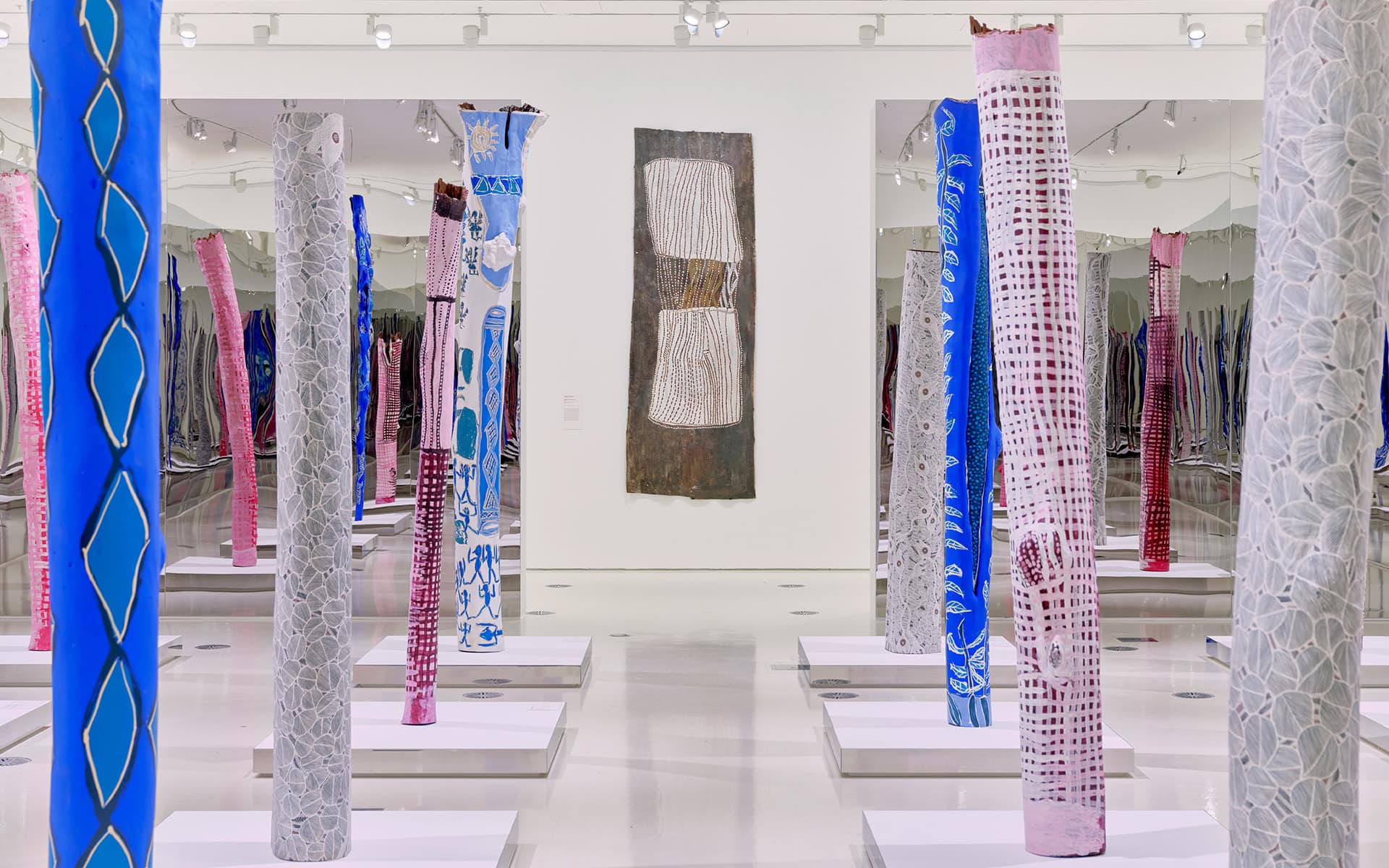 Installation view of <em>Bark Ladies: Eleven Artists from Yirrkala</em> on display until 25 April 2022 at NGV International, Melbourne. Photo: Tom Ross