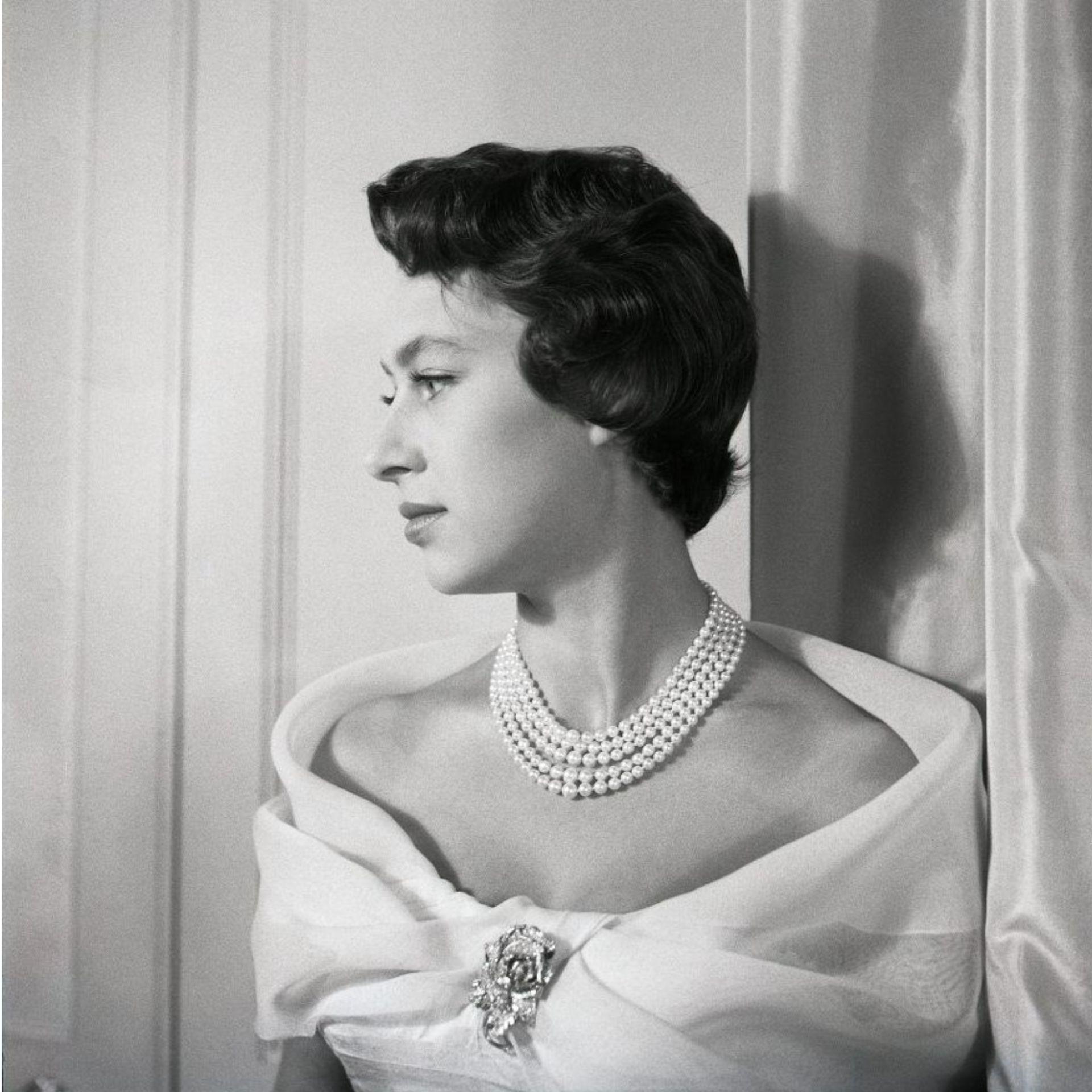 Princess Margaret of England wearing her Rose clip brooch, 1955, commissioned by Cartier London in 1938. Photo © Cecil Beaton, V&A Images