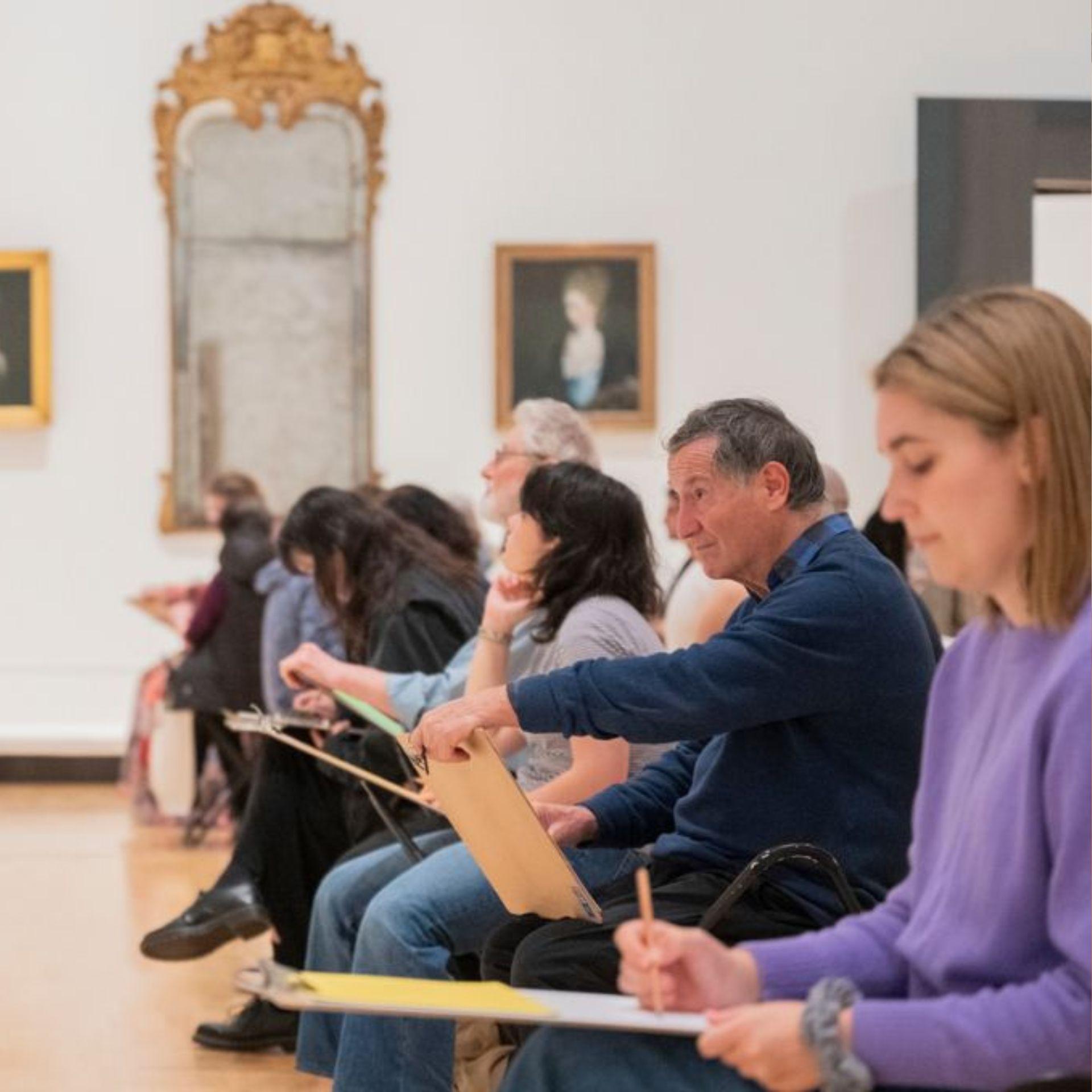 Visitors participating in Telstra into Art Series Drop by Drawing program in the Collection Galleries at NGV International. Photo Nick Robertson